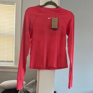 Nike Women's Dri-Fit Long Sleeve Top. Pink